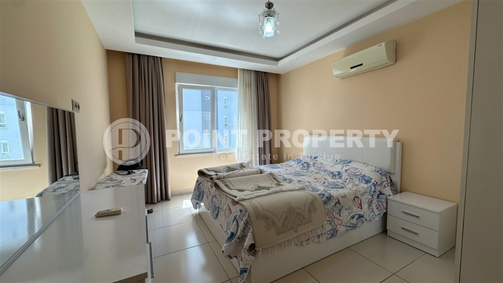 Spacious 1+1 apartment, with a total area of 70 m2, on the 3rd floor in a residential complex with hotel infrastructure in the center of Mahmutlar district-id-8002-photo-6