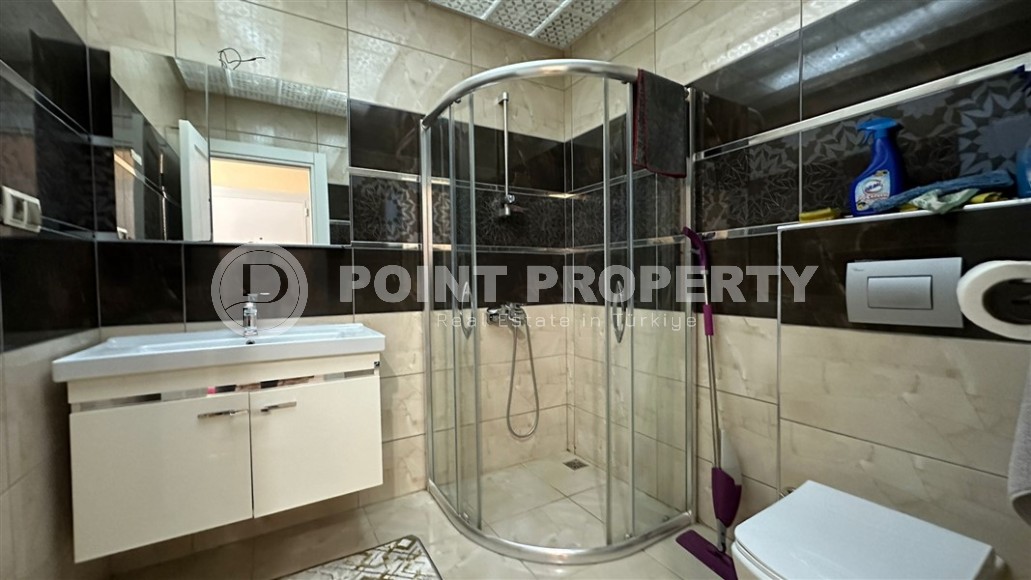 Spacious 1+1 apartment, with a total area of 70 m2, on the 3rd floor in a residential complex with hotel infrastructure in the center of Mahmutlar district-id-8002-photo-9