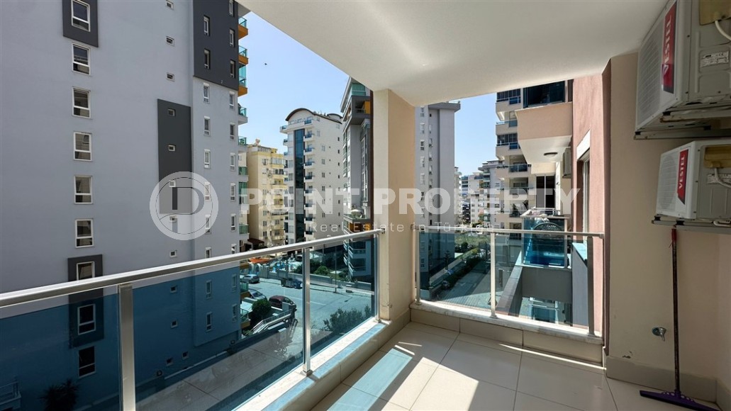 Spacious 1+1 apartment, with a total area of 70 m2, on the 3rd floor in a residential complex with hotel infrastructure in the center of Mahmutlar district-id-8002-photo-11