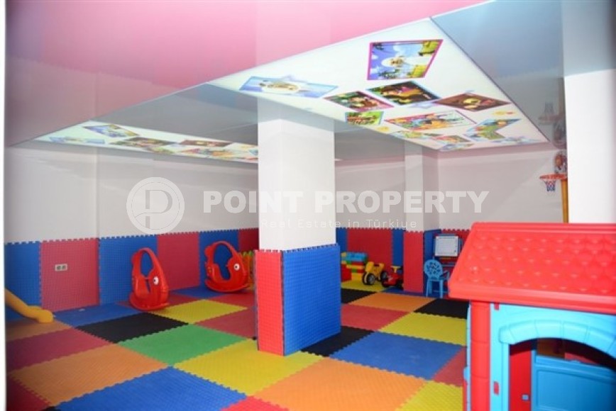 Spacious 1+1 apartment, with a total area of 70 m2, on the 3rd floor in a residential complex with hotel infrastructure in the center of Mahmutlar district-id-8002-photo-16