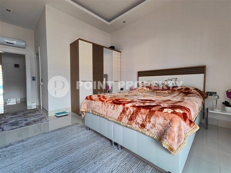 Panoramic two-level apartment with sea and mountain views, in the center of the picturesque area of Alanya - Tosmur-id-8016-photo-7