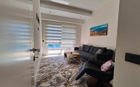 Panoramic two-level apartment with sea and mountain views, in the center of the picturesque area of Alanya - Tosmur-id-8016-photo-9