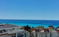 Panoramic two-level apartment with sea and mountain views, in the center of the picturesque area of Alanya - Tosmur-id-8016-photo-26