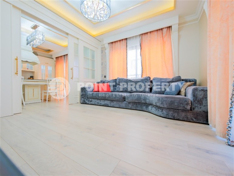 Современная квартира 2+1 на 1-м этаже в элитном жилом комплексе в центре Аланьи-id-8029-фото-2