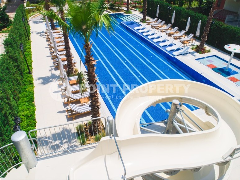 Современная квартира 2+1 на 1-м этаже в элитном жилом комплексе в центре Аланьи-id-8029-фото-35