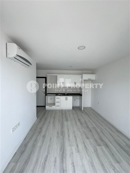 Квартира 1+1 с чистовой отделкой, в перспективном районе Аланьи - Авсаллар-id-8032-фото-2