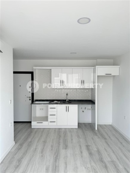 Квартира 1+1 с чистовой отделкой, в перспективном районе Аланьи - Авсаллар-id-8032-фото-3