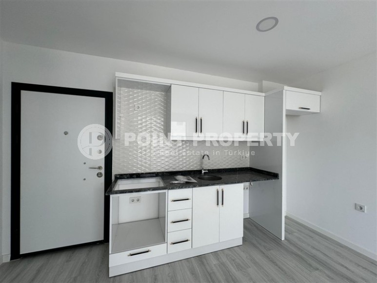 Квартира 1+1 с чистовой отделкой, в перспективном районе Аланьи - Авсаллар-id-8032-фото-4