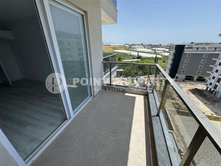 Квартира 1+1 с чистовой отделкой, в перспективном районе Аланьи - Авсаллар-id-8032-фото-9