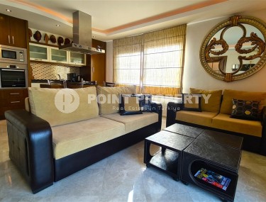 Ready-to-move-in apartment with furniture and household appliances 50 meters from the sea, in the center of the prestigious area of Alanya - Kestel-id-8043-photo-2