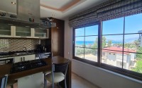 Ready-to-move-in apartment with furniture and household appliances 50 meters from the sea, in the center of the prestigious area of Alanya - Kestel-id-8043-photo-5