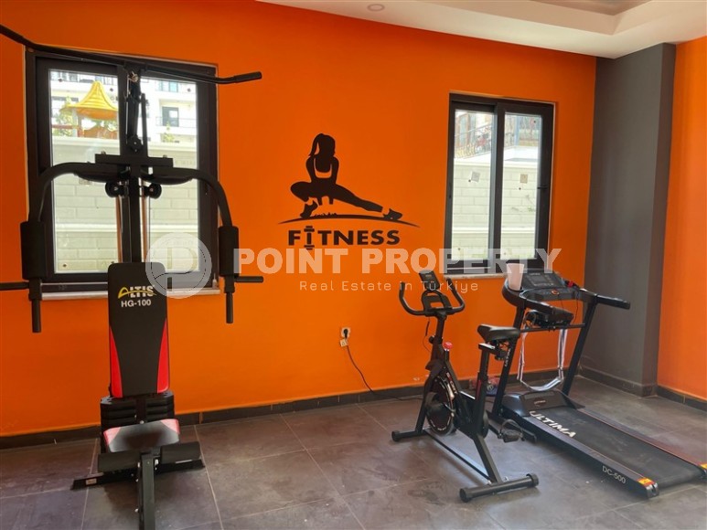 Апартаменты и дуплексы с площадью  45 - 120 м2 в резиденции на этапе строительства, район Махмутлар-id-3711-фото-12