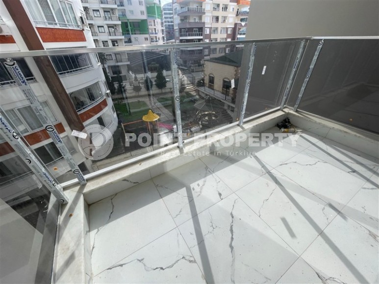 Апартаменты и дуплексы с площадью  45 - 120 м2 в резиденции на этапе строительства, район Махмутлар-id-3711-фото-14