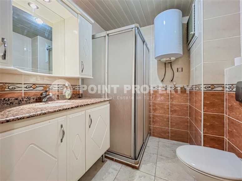 Bright, atmospheric 2+1 apartment 50 meters from the sea, in the center of the modern area of Alanya - Mahmutrar-id-8049-photo-13