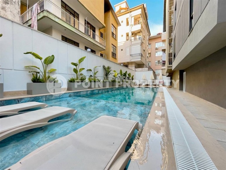 Panoramic two-level apartment 3+1 in the center of Alanya, 400 meters from the famous Cleopatra Beach-id-8050-photo-24