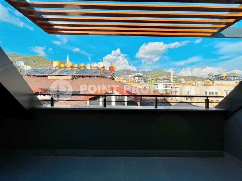 Panoramic two-level apartment 3+1 in the center of Alanya, 400 meters from the famous Cleopatra Beach-id-8050-photo-27