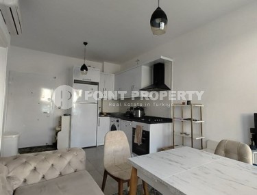 Ready-to-move-in apartment with furniture and household appliances, one and a half kilometers from the sea, in the Mahmutlar area-id-8052-photo-3