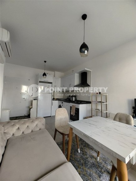 Ready-to-move-in apartment with furniture and household appliances, one and a half kilometers from the sea, in the Mahmutlar area-id-8052-photo-3