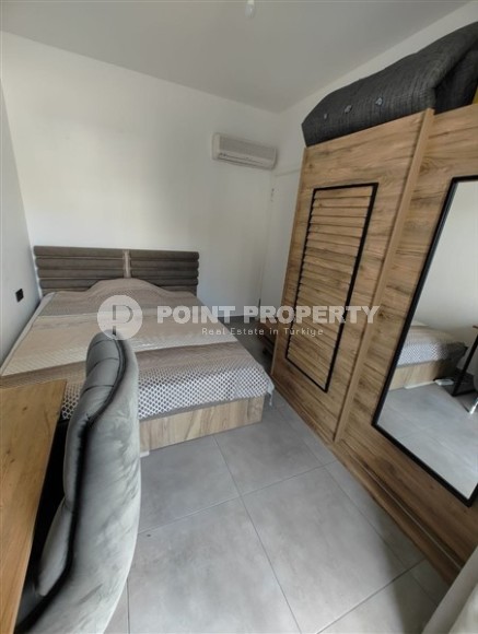 Ready-to-move-in apartment with furniture and household appliances, one and a half kilometers from the sea, in the Mahmutlar area-id-8052-photo-4