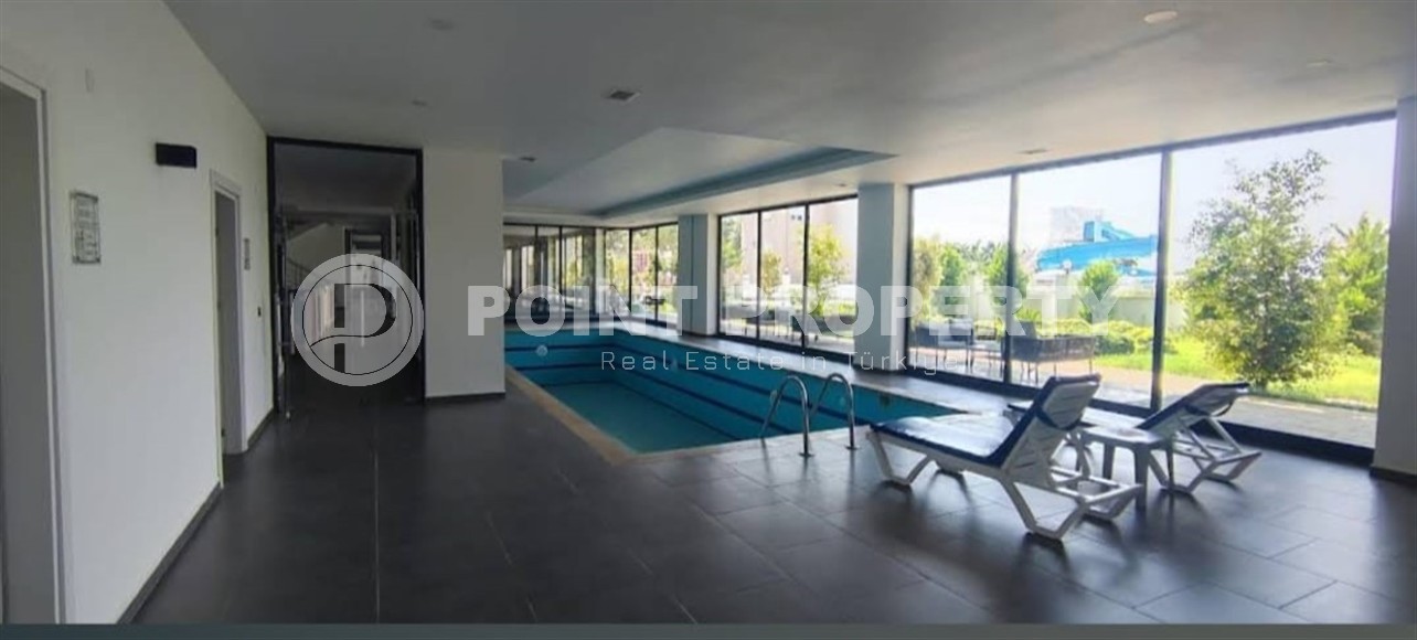 Ready-to-move-in apartment with furniture and household appliances, one and a half kilometers from the sea, in the Mahmutlar area-id-8052-photo-12