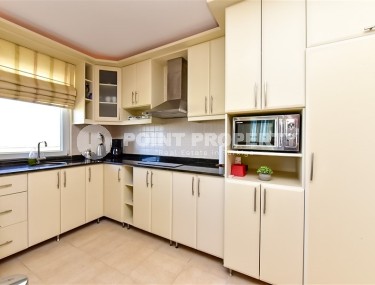 Panoramic apartment 2+1 with sea views, on the 8th floor, in the center of Mahmutlar district-id-8056-photo-4