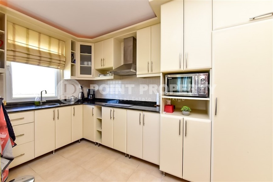 Panoramic apartment 2+1 with sea views, on the 8th floor, in the center of Mahmutlar district-id-8056-photo-4