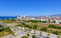 Panoramic apartment 2+1 with sea views, on the 8th floor, in the center of Mahmutlar district-id-8056-photo-13