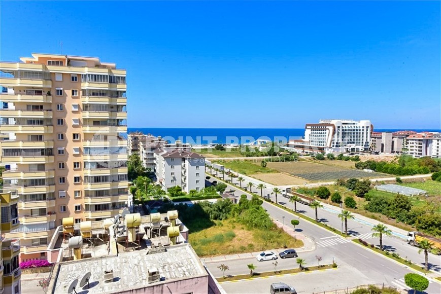 Panoramic apartment 2+1 with sea views, on the 8th floor, in the center of Mahmutlar district-id-8056-photo-14