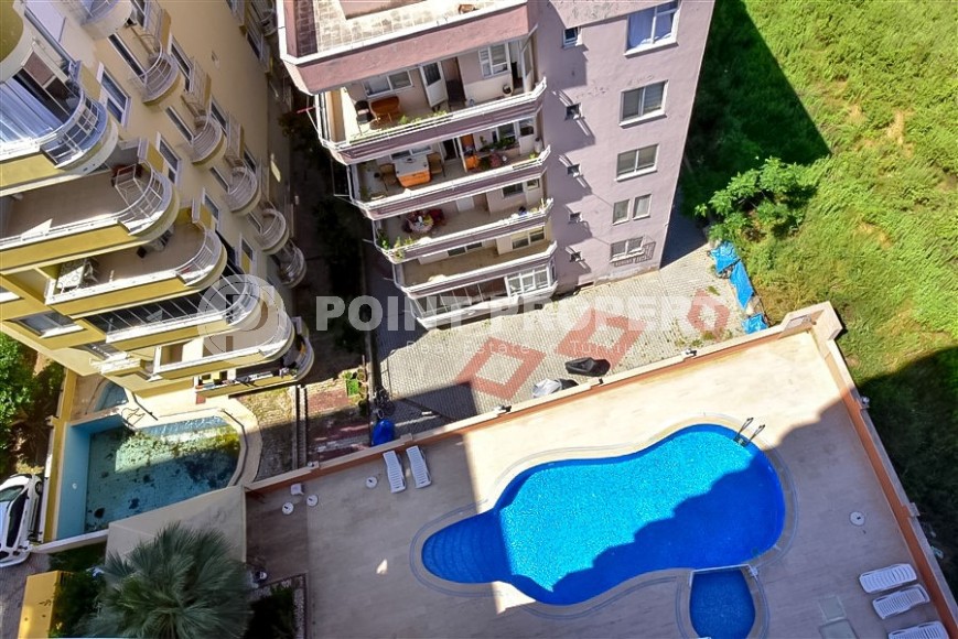Panoramic apartment 2+1 with sea views, on the 8th floor, in the center of Mahmutlar district-id-8056-photo-15