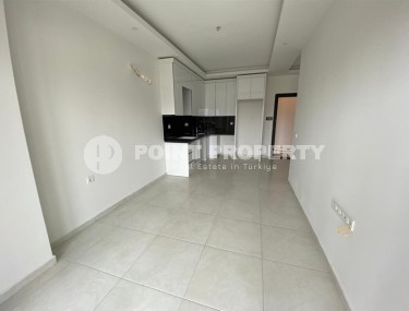 Small new apartment in a modern residential complex with hotel infrastructure, in the center of Mahmutlar-id-8059-photo-2