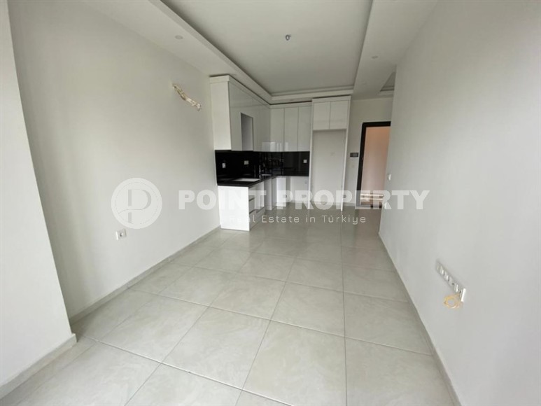 Новая квартира в современном жилом комплексе с отельной инфраструктурой, в центре района Махмутлар-id-8059-фото-2