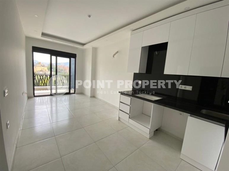 Новая квартира в современном жилом комплексе с отельной инфраструктурой, в центре района Махмутлар-id-8059-фото-3