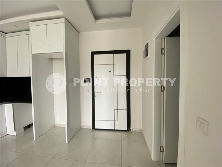 Новая квартира в современном жилом комплексе с отельной инфраструктурой, в центре района Махмутлар-id-8059-фото-4