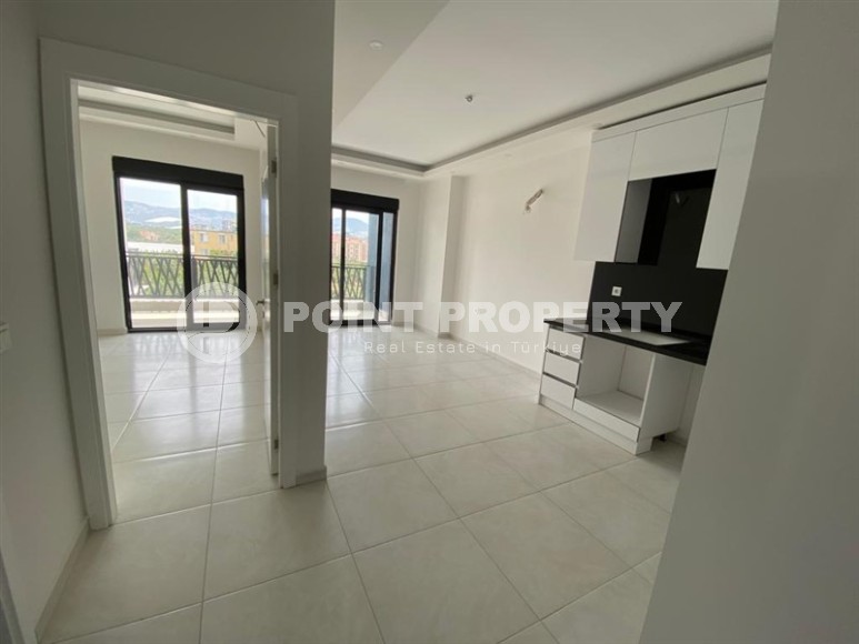 Новая квартира в современном жилом комплексе с отельной инфраструктурой, в центре района Махмутлар-id-8059-фото-5