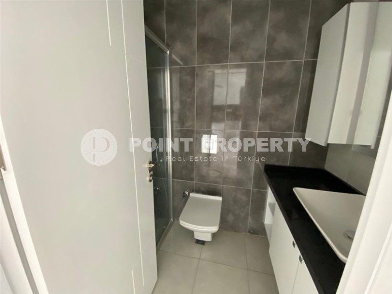 Новая квартира в современном жилом комплексе с отельной инфраструктурой, в центре района Махмутлар-id-8059-фото-7