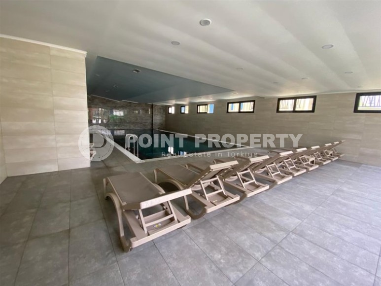 Новая квартира в современном жилом комплексе с отельной инфраструктурой, в центре района Махмутлар-id-8059-фото-11