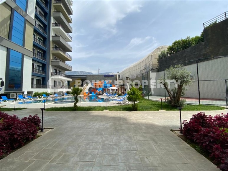 Новая квартира в современном жилом комплексе с отельной инфраструктурой, в центре района Махмутлар-id-8059-фото-17