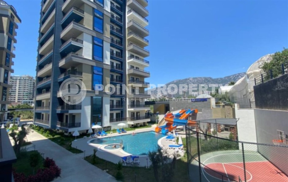 Новая квартира в современном жилом комплексе с отельной инфраструктурой, в центре района Махмутлар-id-8059-фото-18