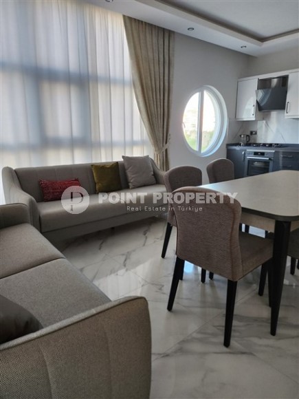 Просторная комфортабельная квартира 3+1 на берегу Средиземного моря в районе Махмутлар.-id-8061-photo-4