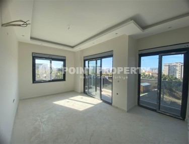 1+1 apartments in a residential complex at the final stage of construction, in the popular area of Alanya - Mahmutlar-id-8064-photo-4