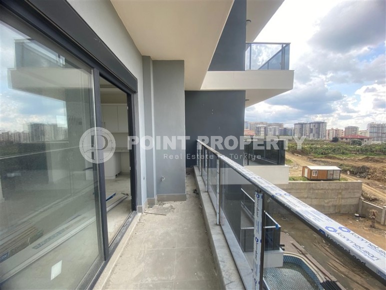 Квартиры 1+1 в жилом комплексе на завершающем этапе строительства, в популярном районе Аланьи - Махмутлар-id-8064-фото-10