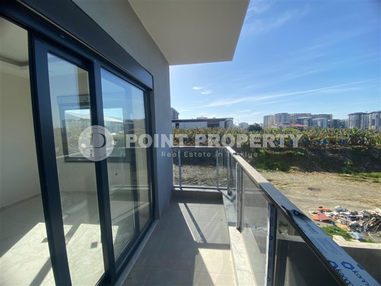 Квартиры 1+1 в жилом комплексе на завершающем этапе строительства, в популярном районе Аланьи - Махмутлар-id-8064-фото-12