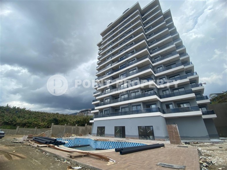 Квартиры 1+1 в жилом комплексе на завершающем этапе строительства, в популярном районе Аланьи - Махмутлар-id-8064-фото-16