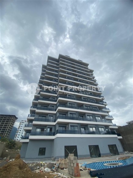 Квартиры 1+1 в жилом комплексе на завершающем этапе строительства, в популярном районе Аланьи - Махмутлар-id-8064-фото-17