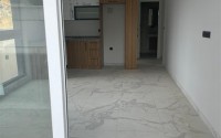 Inexpensive 1+1 apartment on the 1st floor in a residential complex at the final stage of construction-id-8065-photo-3