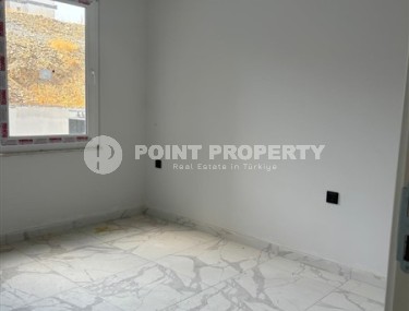 Inexpensive 1+1 apartment on the 1st floor in a residential complex at the final stage of construction-id-8065-photo-5