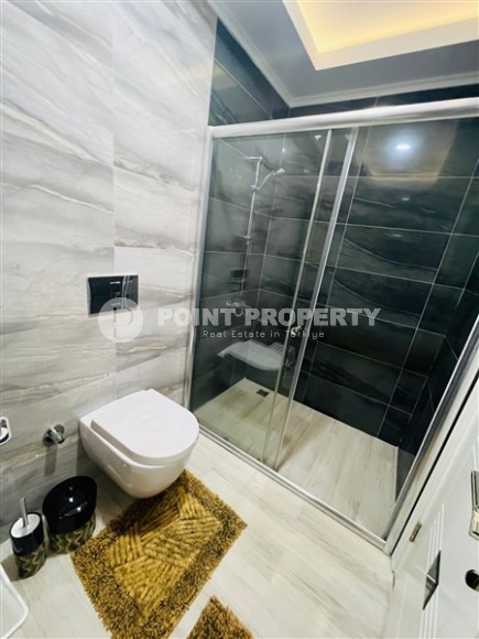 Комфортабельная квартира на 8-м этаже в жилом комплексе с инфраструктурой «город в городе», в центре района Махмутлар-id-8066-фото-10