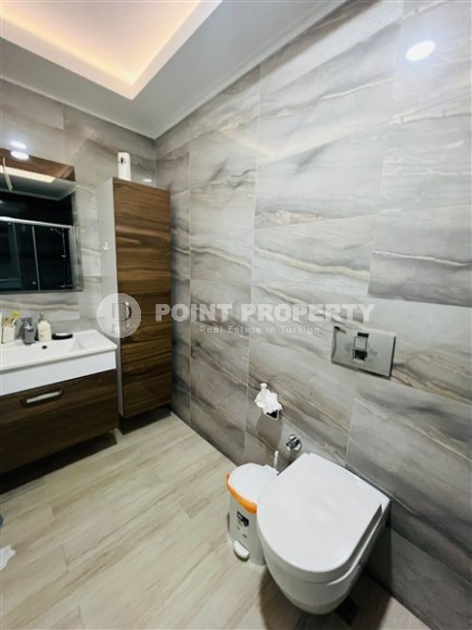 Комфортабельная квартира на 8-м этаже в жилом комплексе с инфраструктурой «город в городе», в центре района Махмутлар-id-8066-фото-12