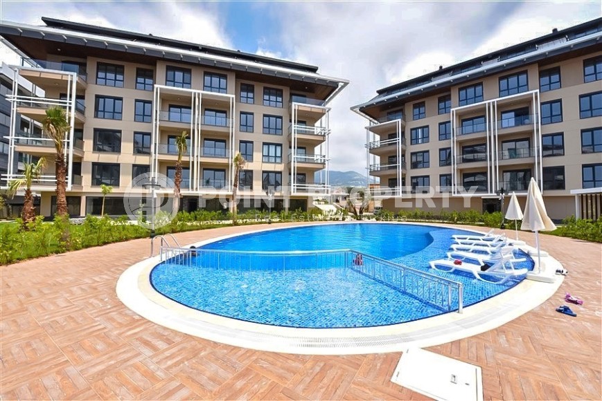 Квартиры в новом жилом комплексе с отельной инфраструктурой в районе Оба, Алания-id-1708-фото-1