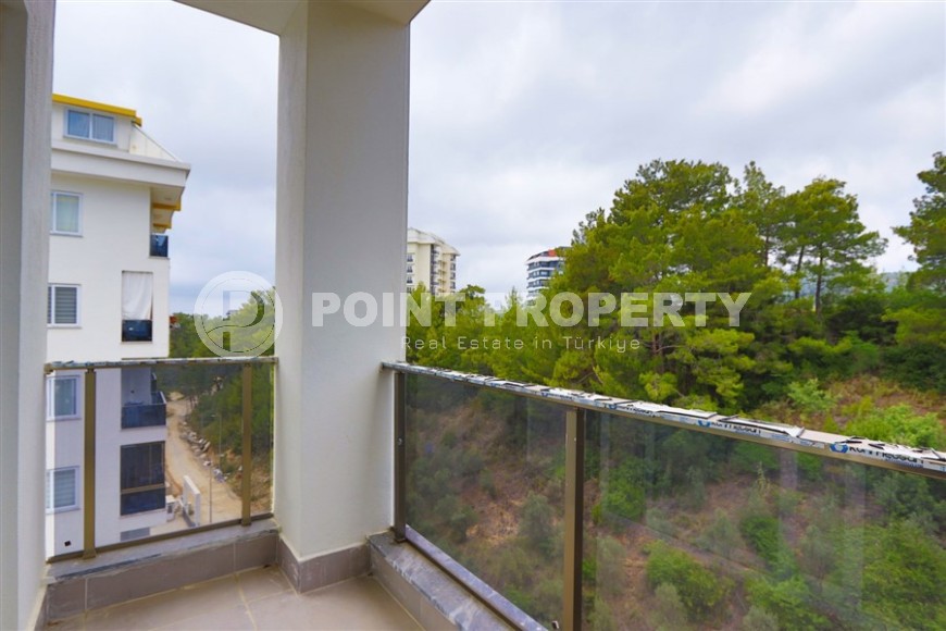 Квартира 1+1 в 1200 метрах от моря, в живописном районе Аланьи - Авсаллар-id-8078-фото-4